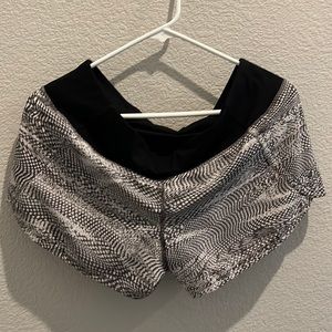 Lululemon running shorts, size 8, perfect condition - no signs of wear.
